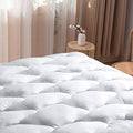 WhatsBedding Waterproof Mattress Pad Twin XL Size Cotton Top Down Alternative by WhatsBedding